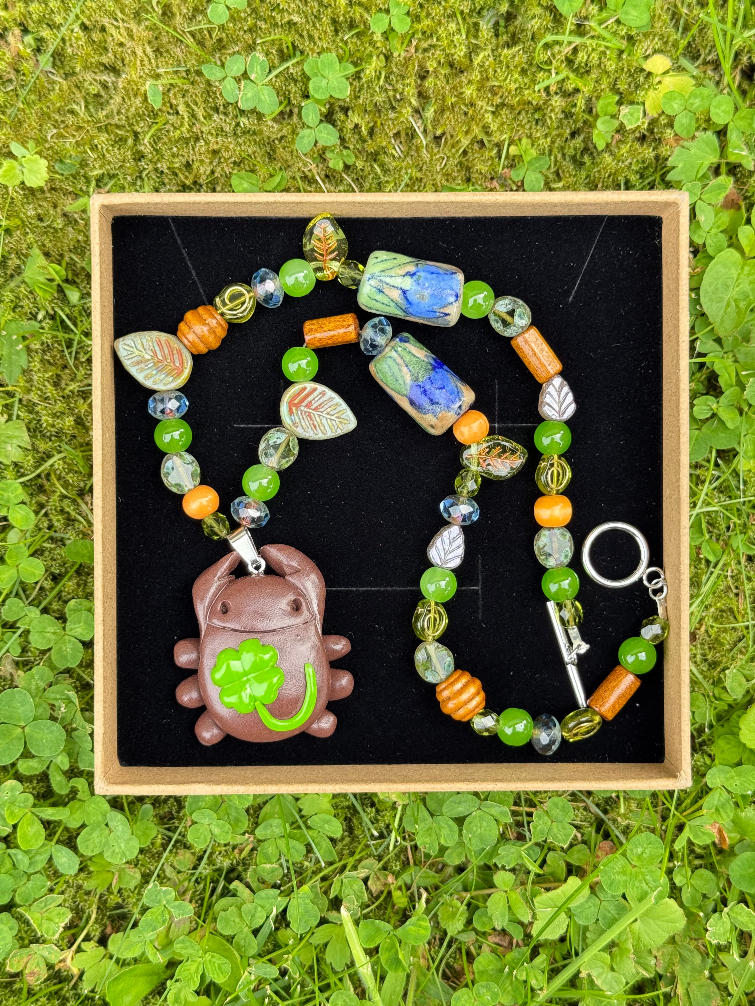 ancient river bug necklace