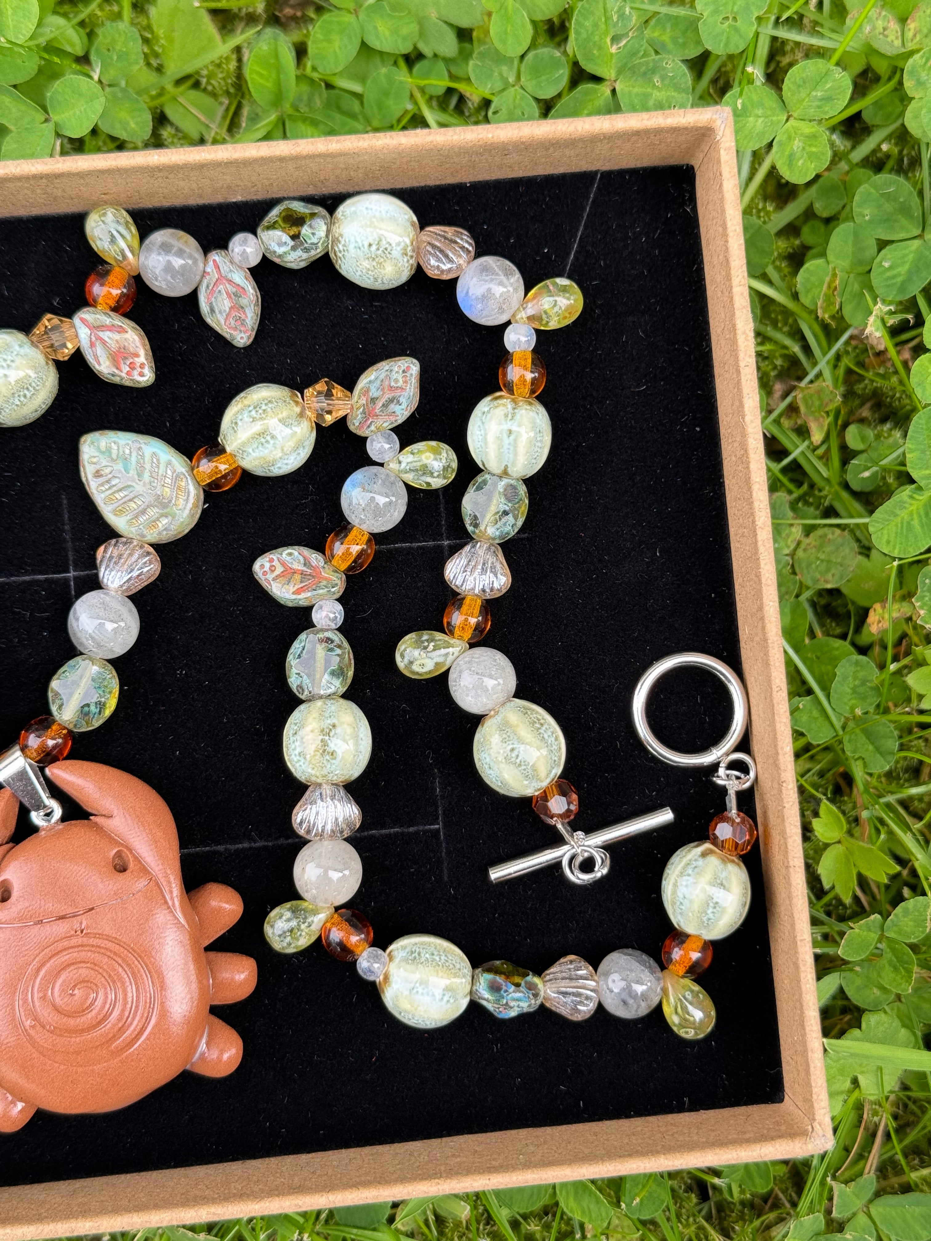 moonchild bug necklace