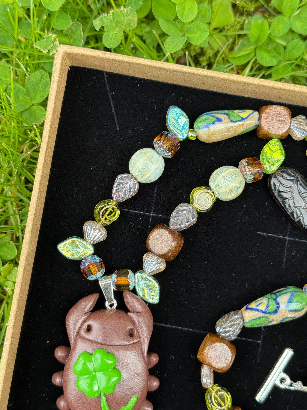 ancient forest bug necklace