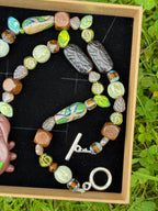 ancient forest bug necklace