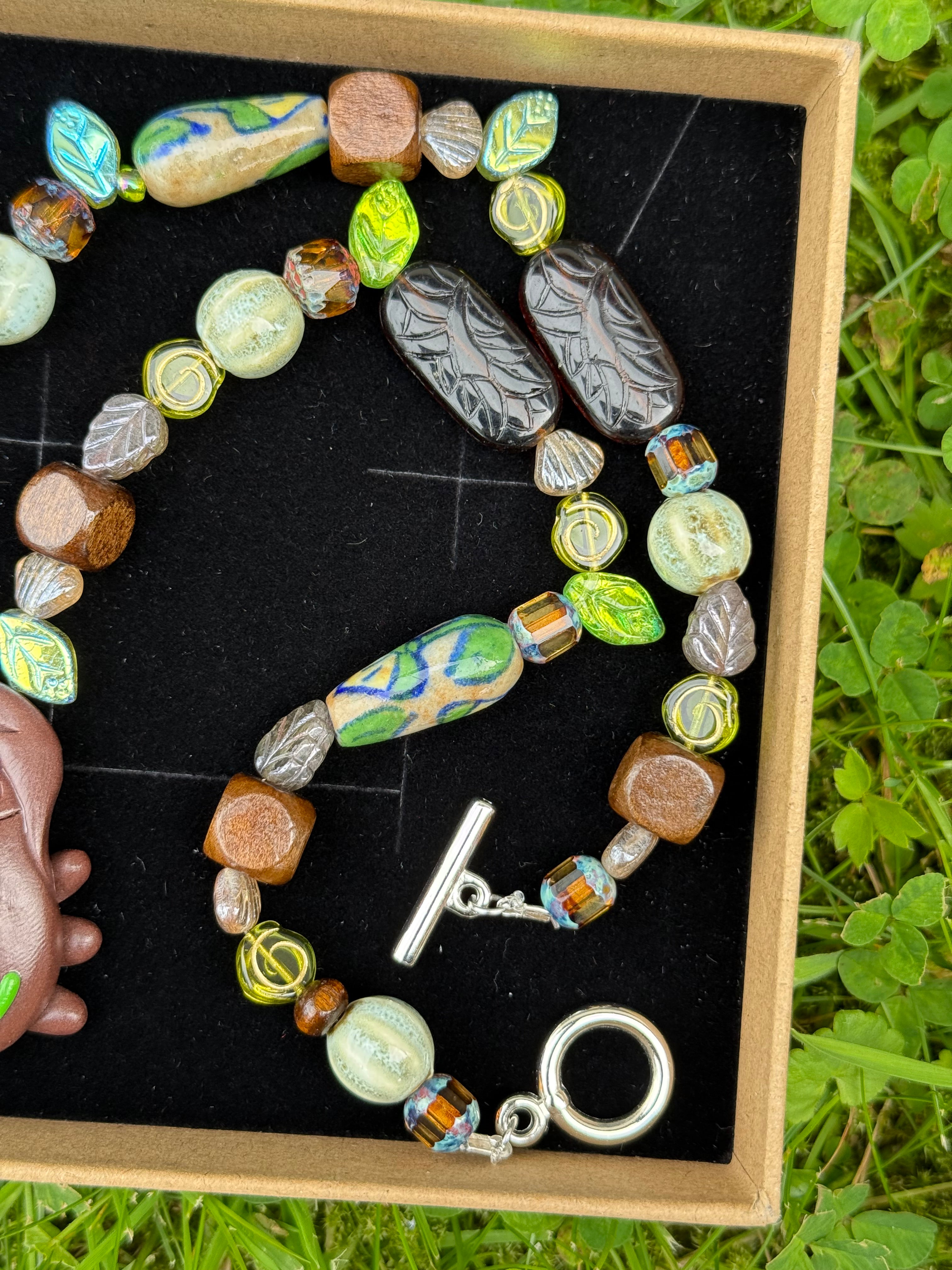 ancient forest bug necklace
