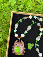 lilly of the valley bug necklace