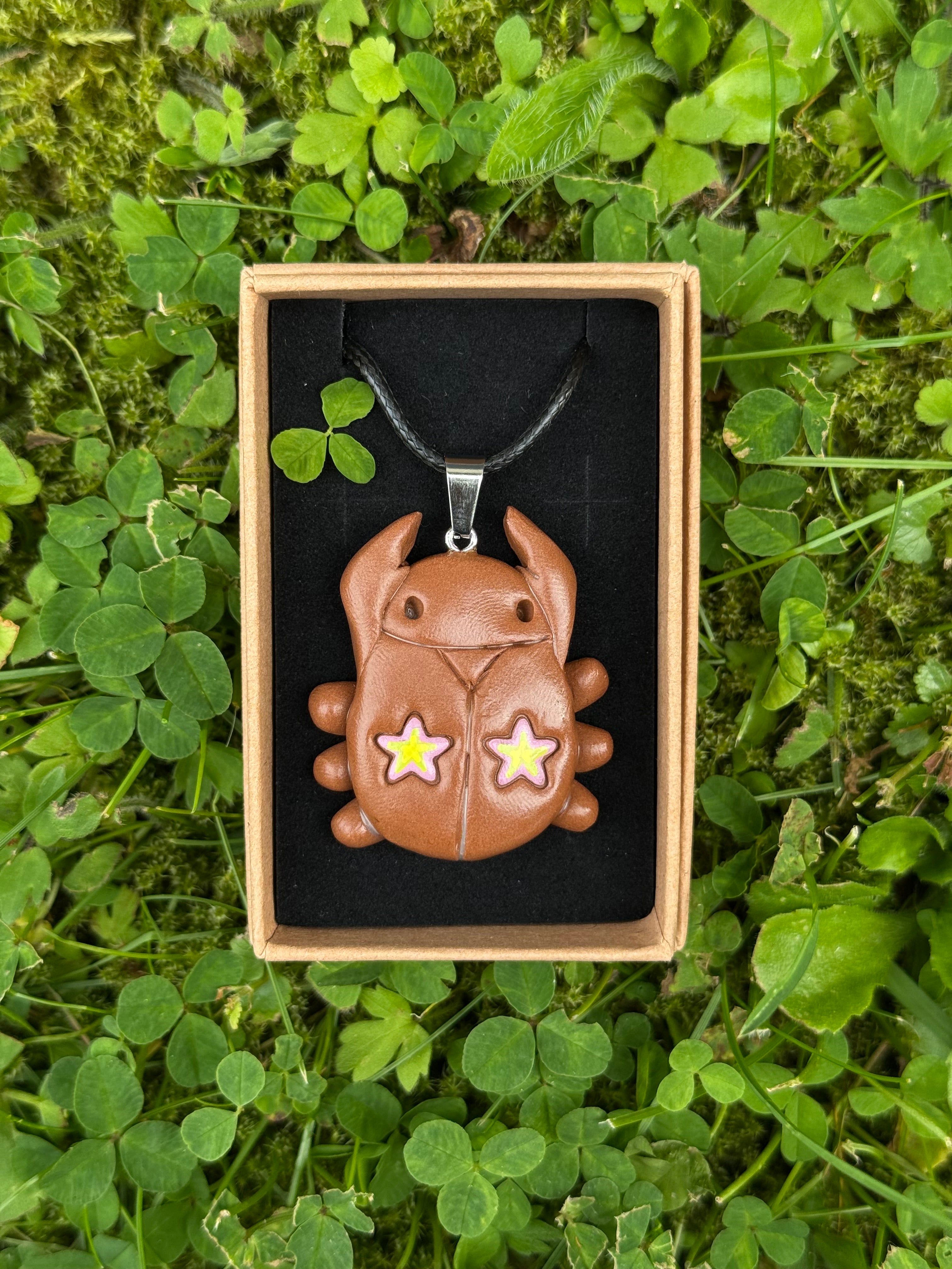 caramel star bug - charm necklace