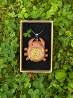 caramel spiral bug - charm necklace