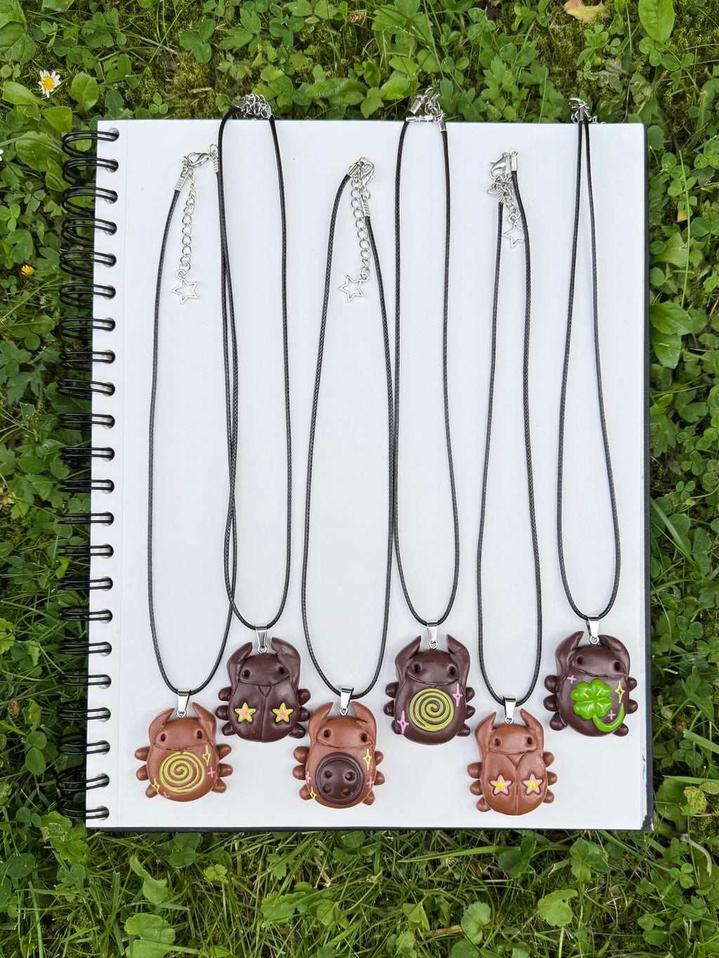 caramel spiral bug - charm necklace