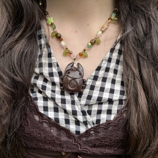 "spring is calling" spiral bug necklace