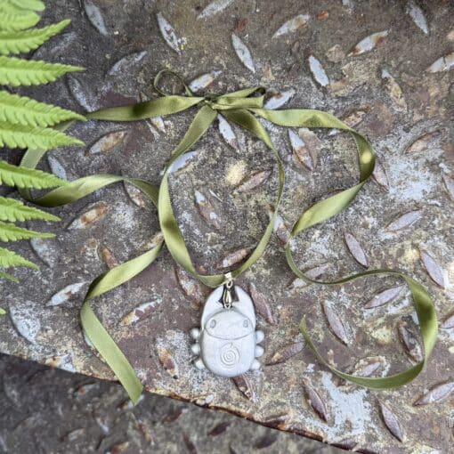green ribbon bug neckklace
